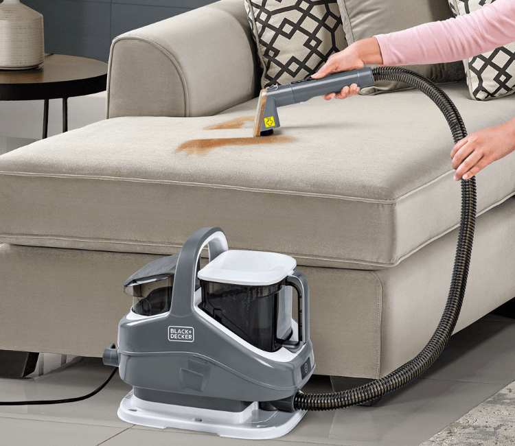 Black+Decker BHSC1350CHS-B5 spot cleaner being used in modern African home