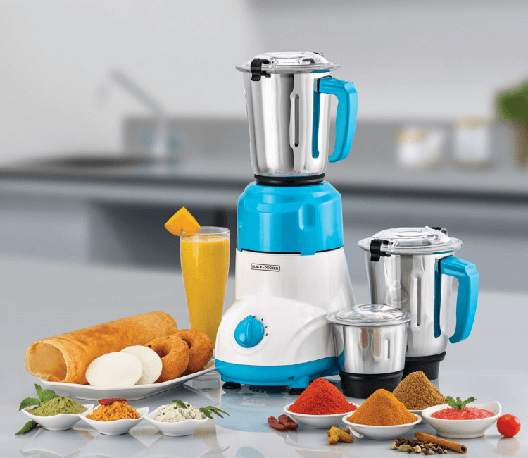 A person using the Black+Decker MG550-B5 Mixer Grinder's largest jar to quickly blend a large quantity of liquid or make a healthy smoothie.